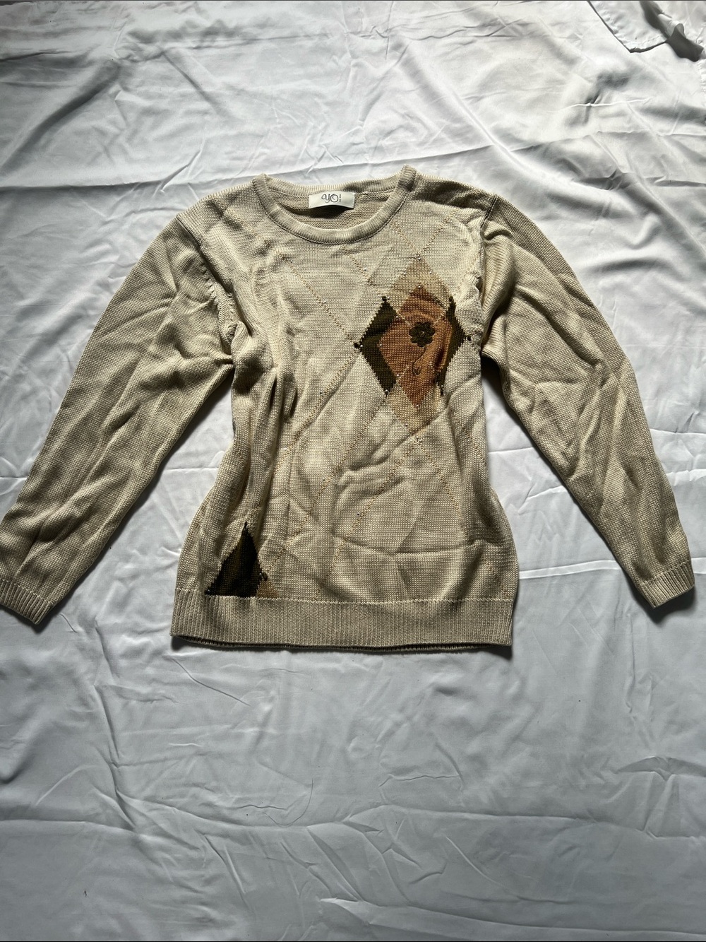 ALO Yoga Cream Argyle Crewneck Sweater with Brown Accents